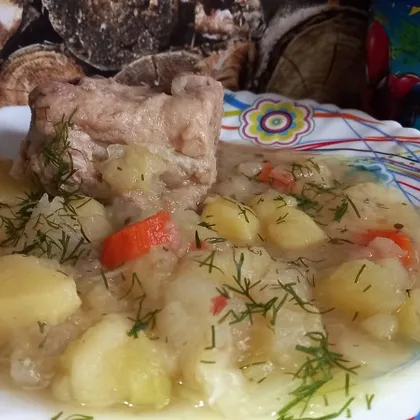 Картофель и капуста тушенные со свининой