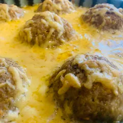 Колдуны с сырной корочкой в духовке