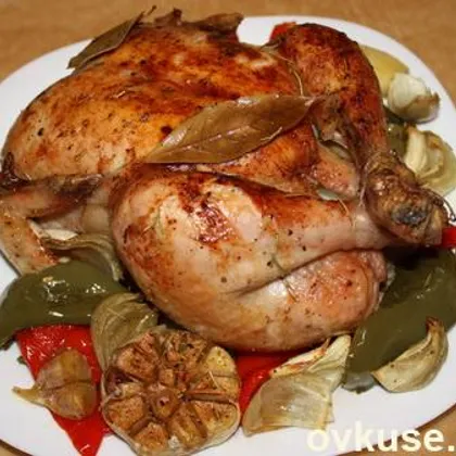 Курица, запеченная с овощами