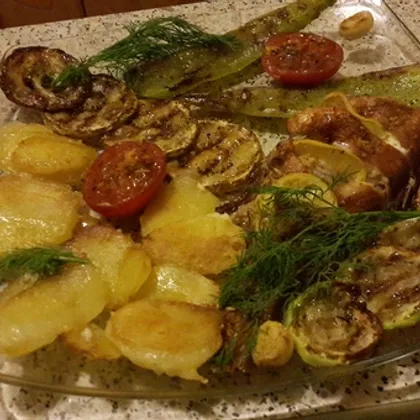 Морской окунь с картошкой и овощами