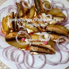 Бутерброды со шпротами и огурцами