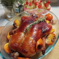 Утка с хурмой и мандаринами