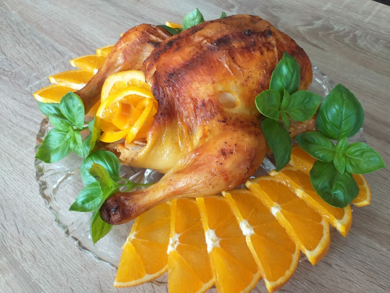 Курица, запечённая в духовке с апельсинами