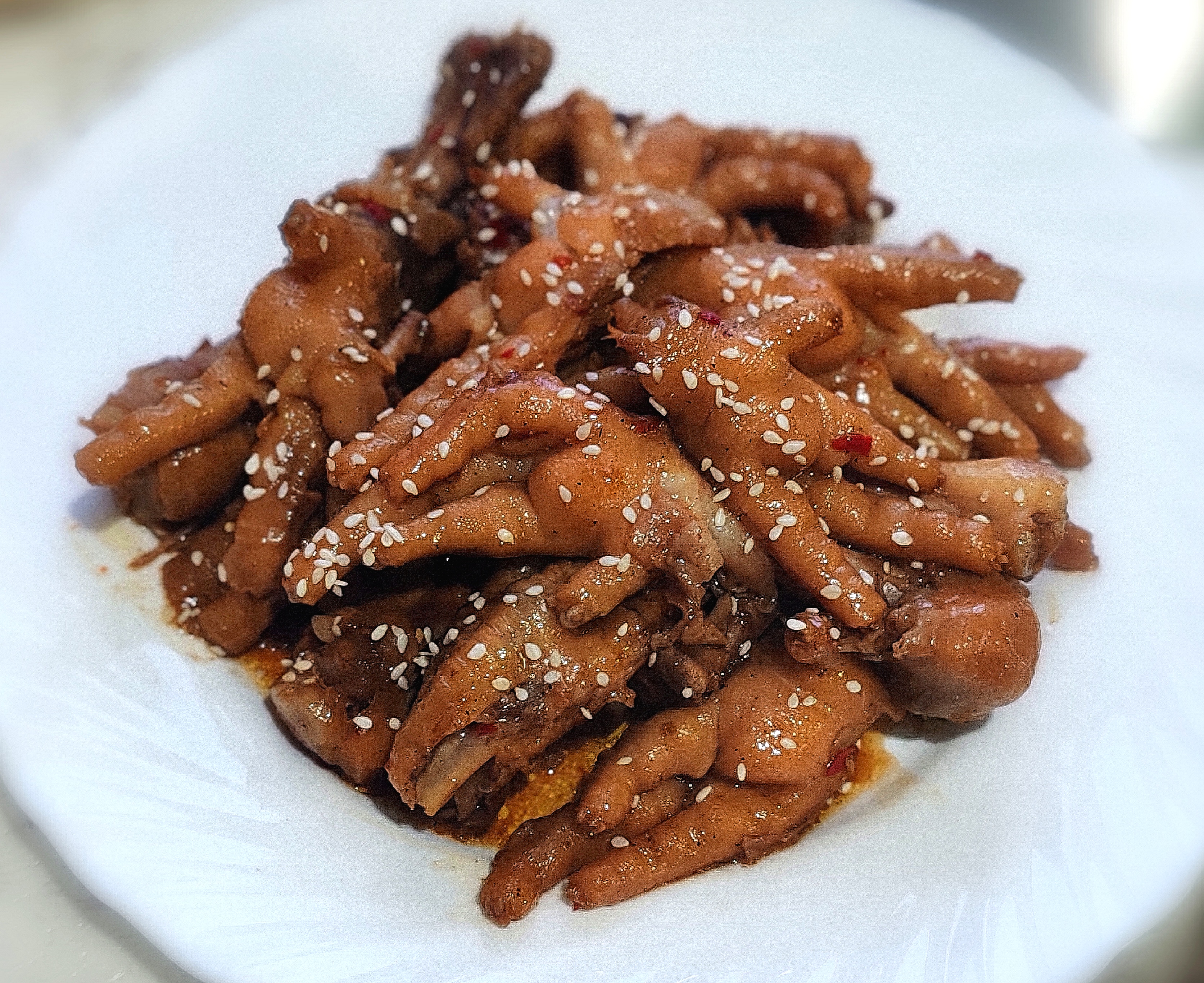 Куриные лапки тушёные в соусе 