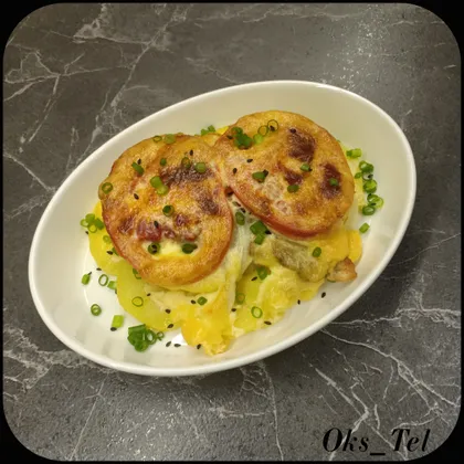 Мясо по-французски с помидорами и грибами