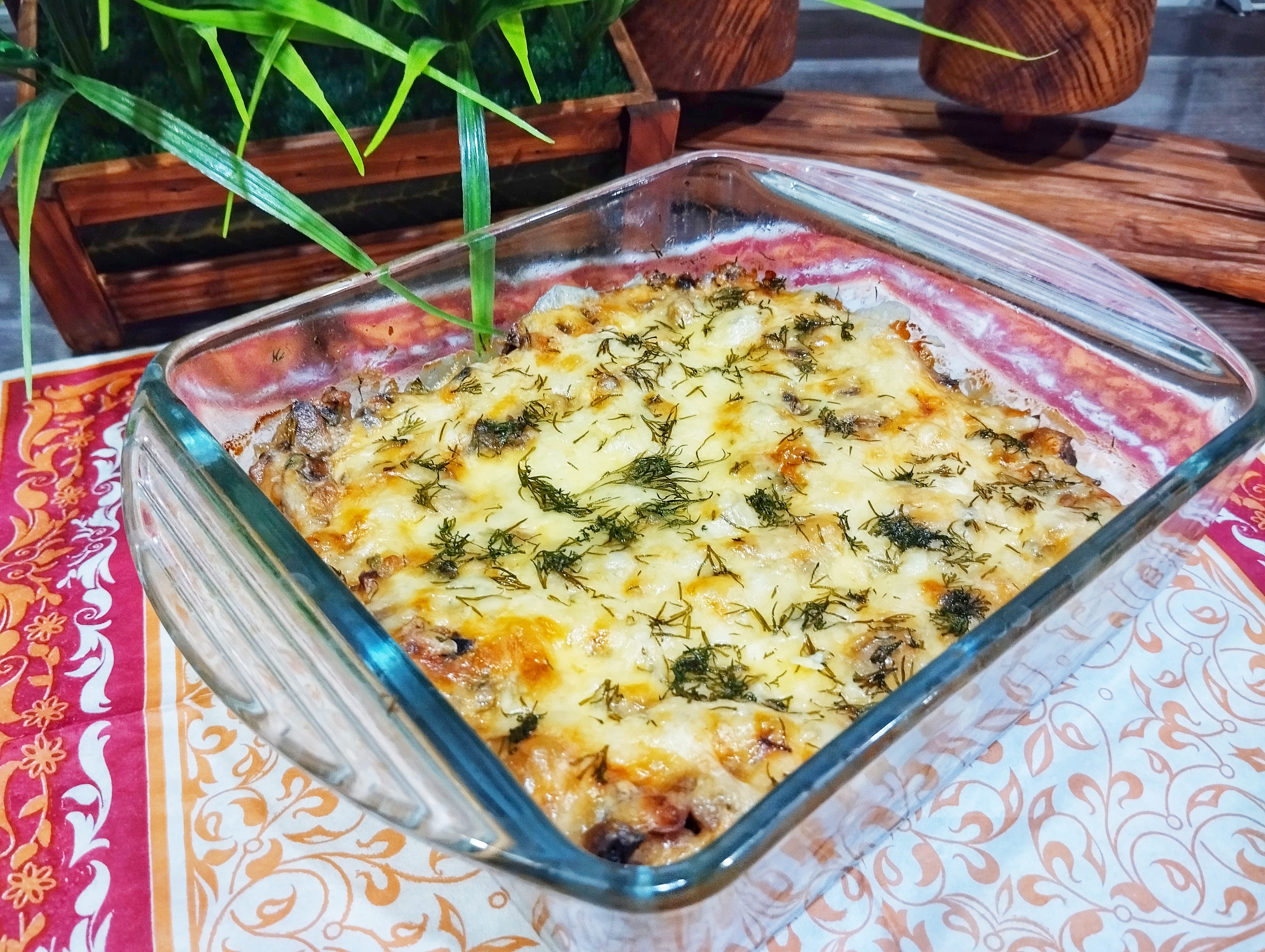 Запеченные шампиньоны под сыром 