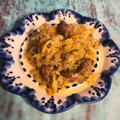 Тушёная капуста с куриными сердечками