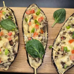 Баклажаны, фаршированные куриными желудками