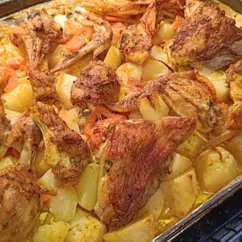 Курица на картошке в духовке