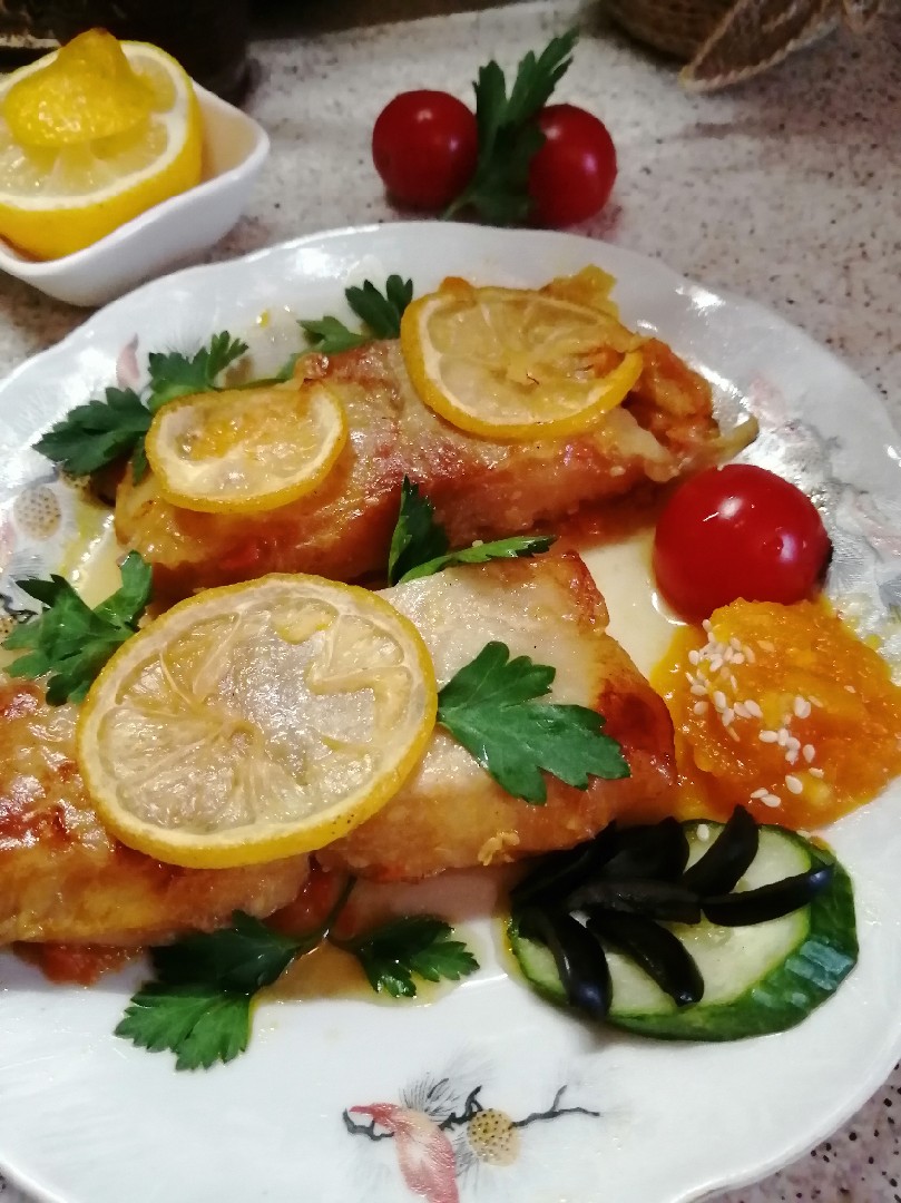 Запечённый морской окунь на овощах
