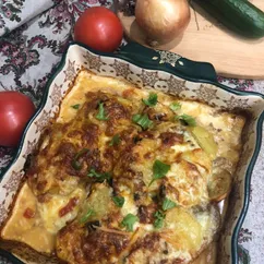 Бульба с мясом под сырной шубой