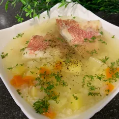 Уха из карасей с пшеном 