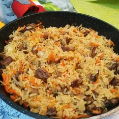 Плов с куриными сердечками