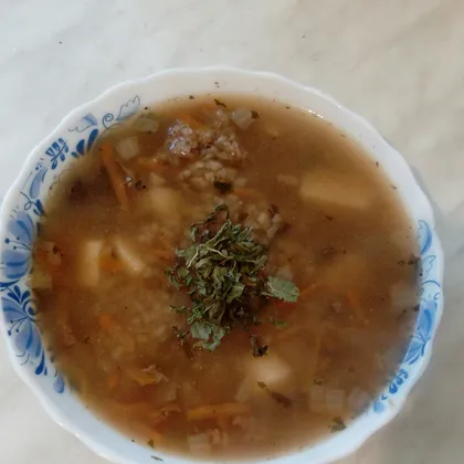 Куриный суп с рисом и сушеными грибами