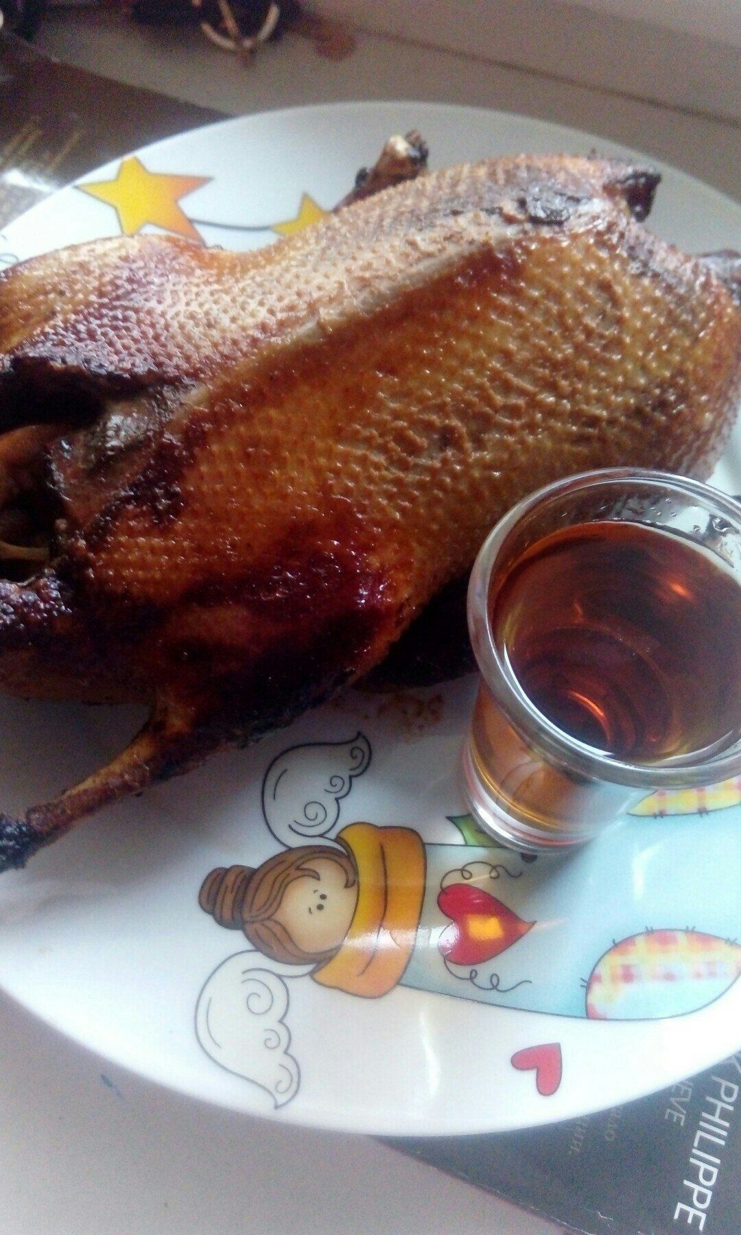Утка с яблоками, медом и коньяком