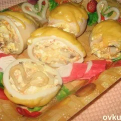 Кальмары фаршированные грибами и сыром