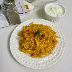 Тушеная капуста с курицей и рисом 
