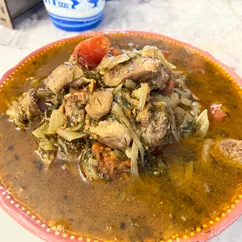 Баранина тушеная с помидорами 