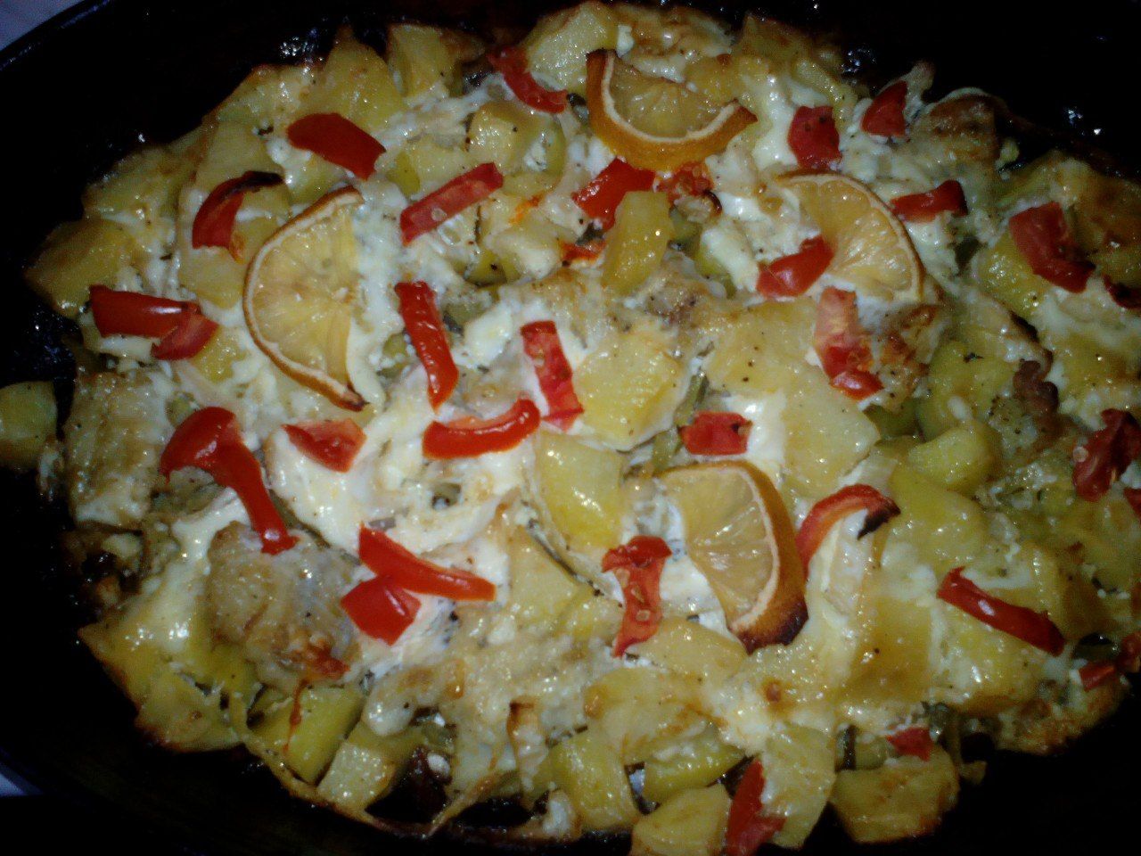 Минтай с картофелем в духовке