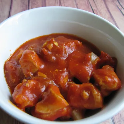 Куриное филе тушеное в томантном соусе с перцем