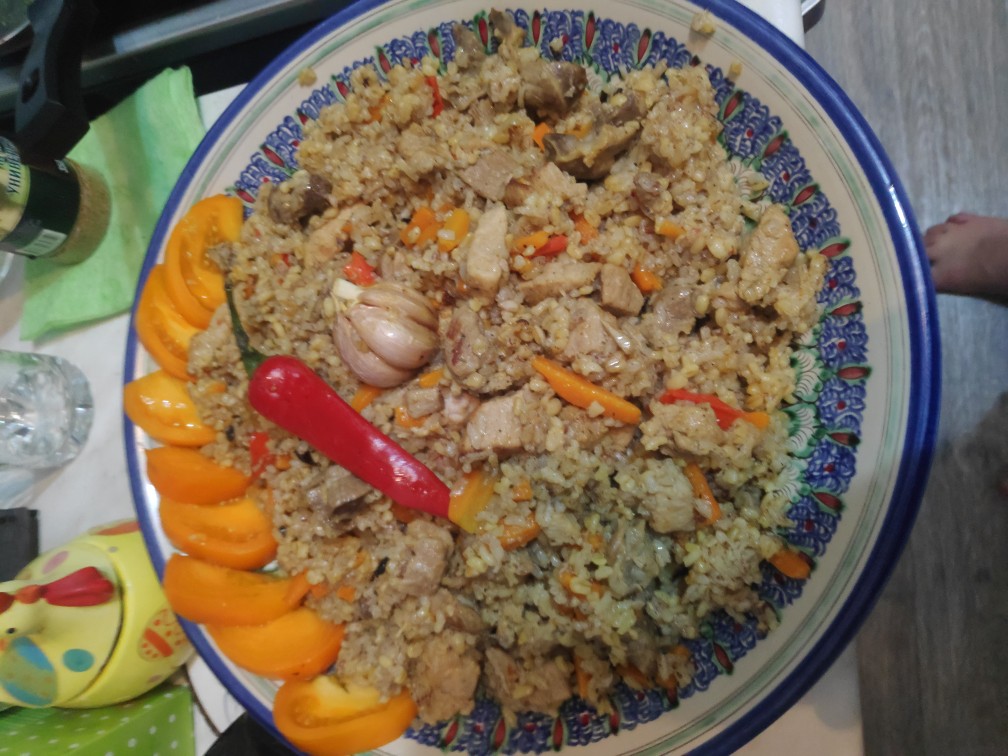 Плов из риса и булгура со свининой и куриными желудками