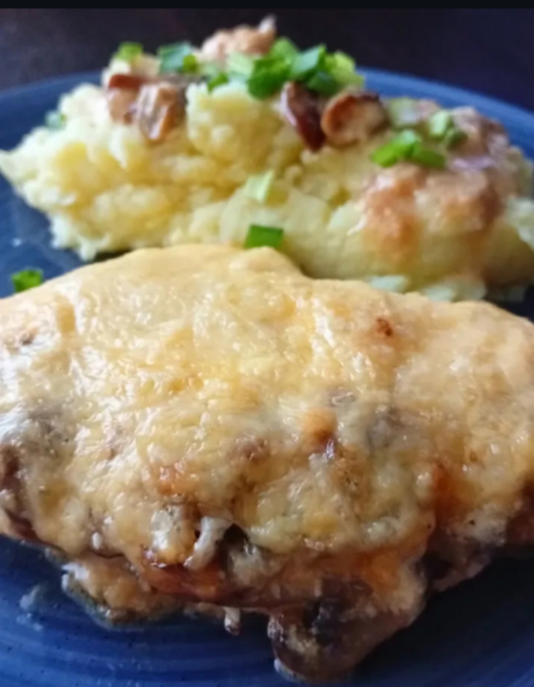 Свинина с грибами под сыром в духовке