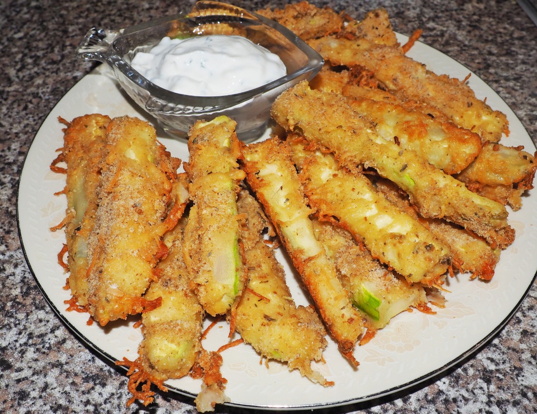 Кабачки с сыром, чесноком и приправами в духовке