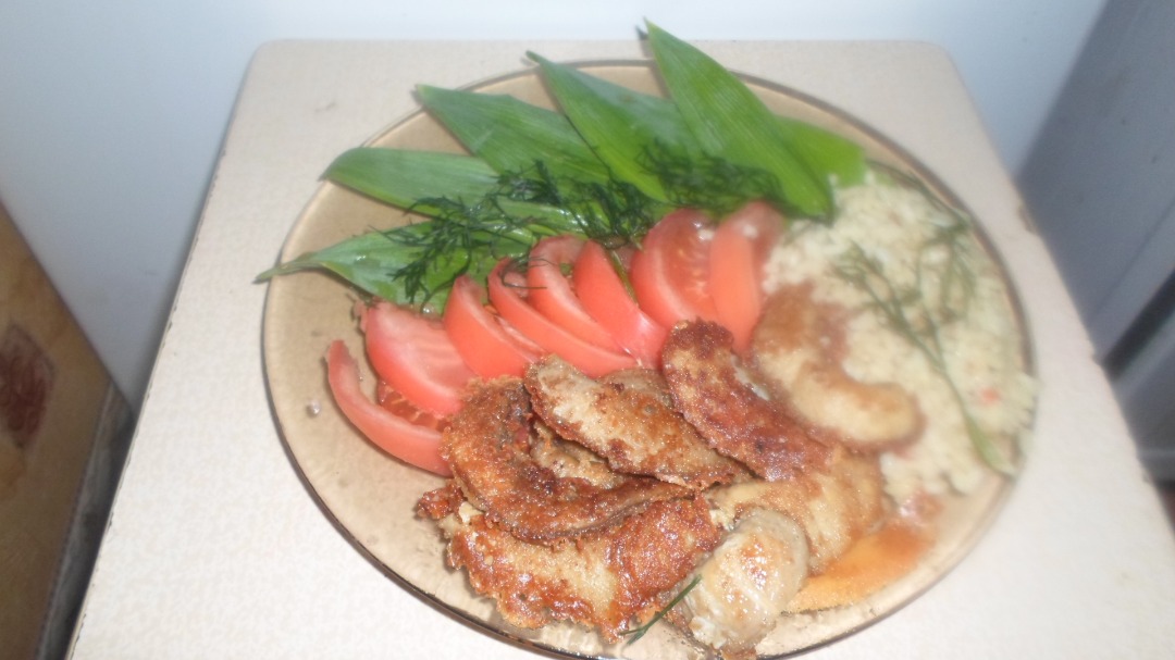Молоки в панировочных сухарях и яйце с рисом
