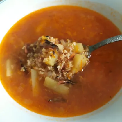 Суп с килькой в томатном соусе и пшеном
